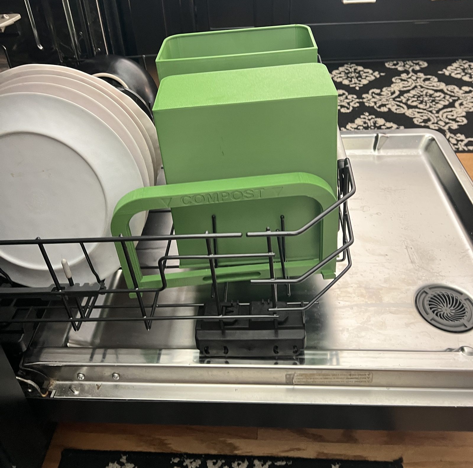 CompostFit pieces in a dishwasher on the top rack
